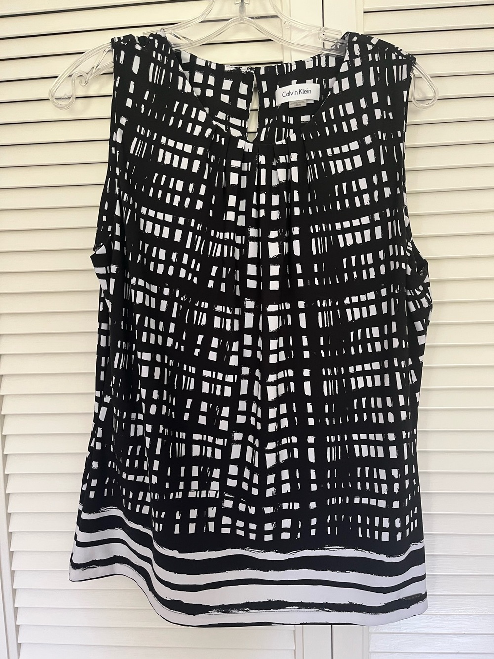 Calvin Klein sleeveless blouse